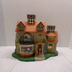 PartyLite Stone Cottage with Orange and Green Accents